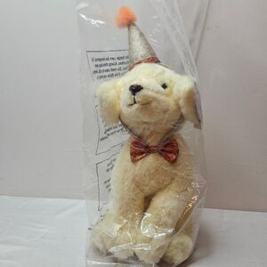 Fao schwarz Stuffed animal dog.